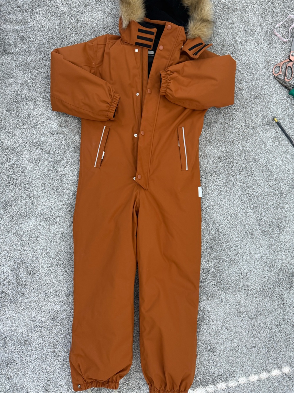 REIMA brand TEC Kids One-Piece in Burnt Orange with Light Blue Accent